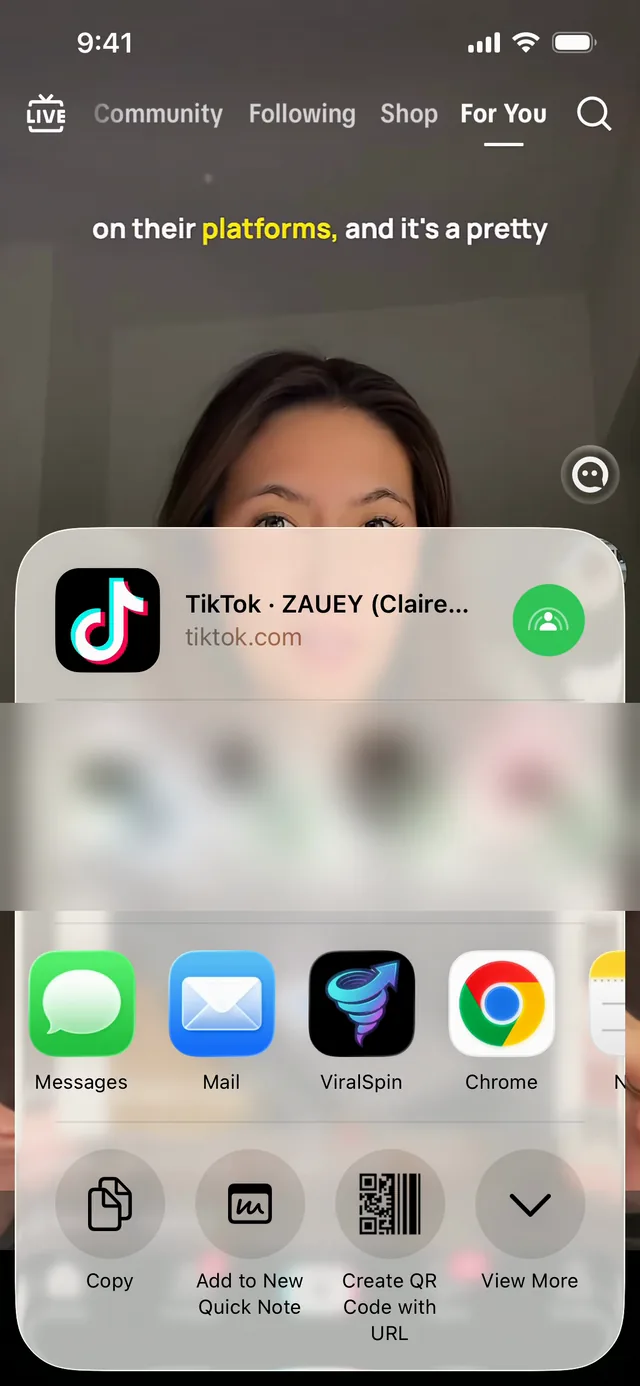 The iOS share sheet over a TikTok video, with ViralSpin in the app row